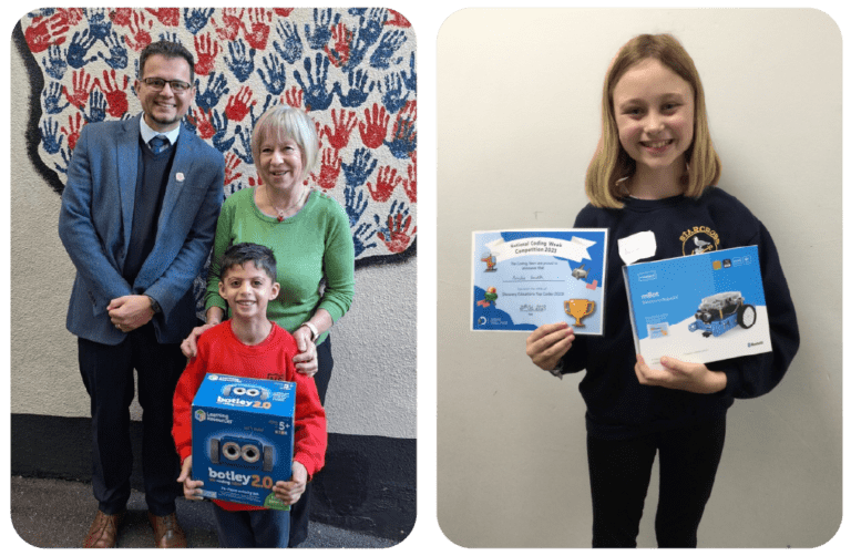 Coding competition winners with their prizes