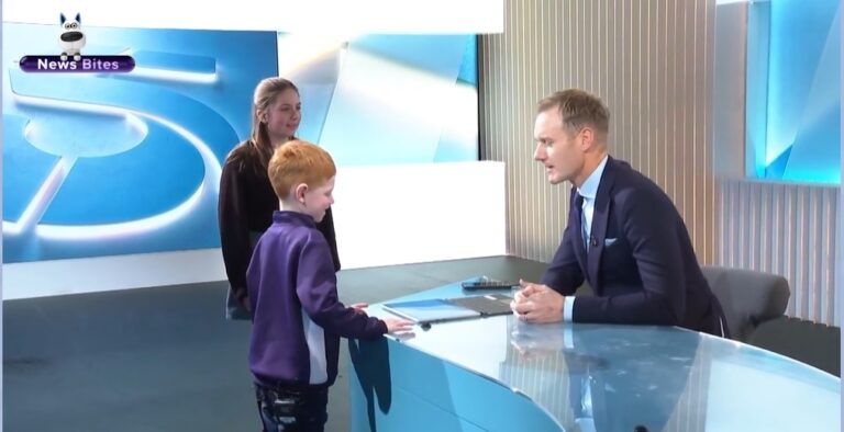 Two children interview Dan Walker from 5 News